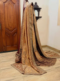 Front view of antique gold bridal dress with dense embroidery and maroon dupatta on mannequin - Èlaan Studio bridal couture